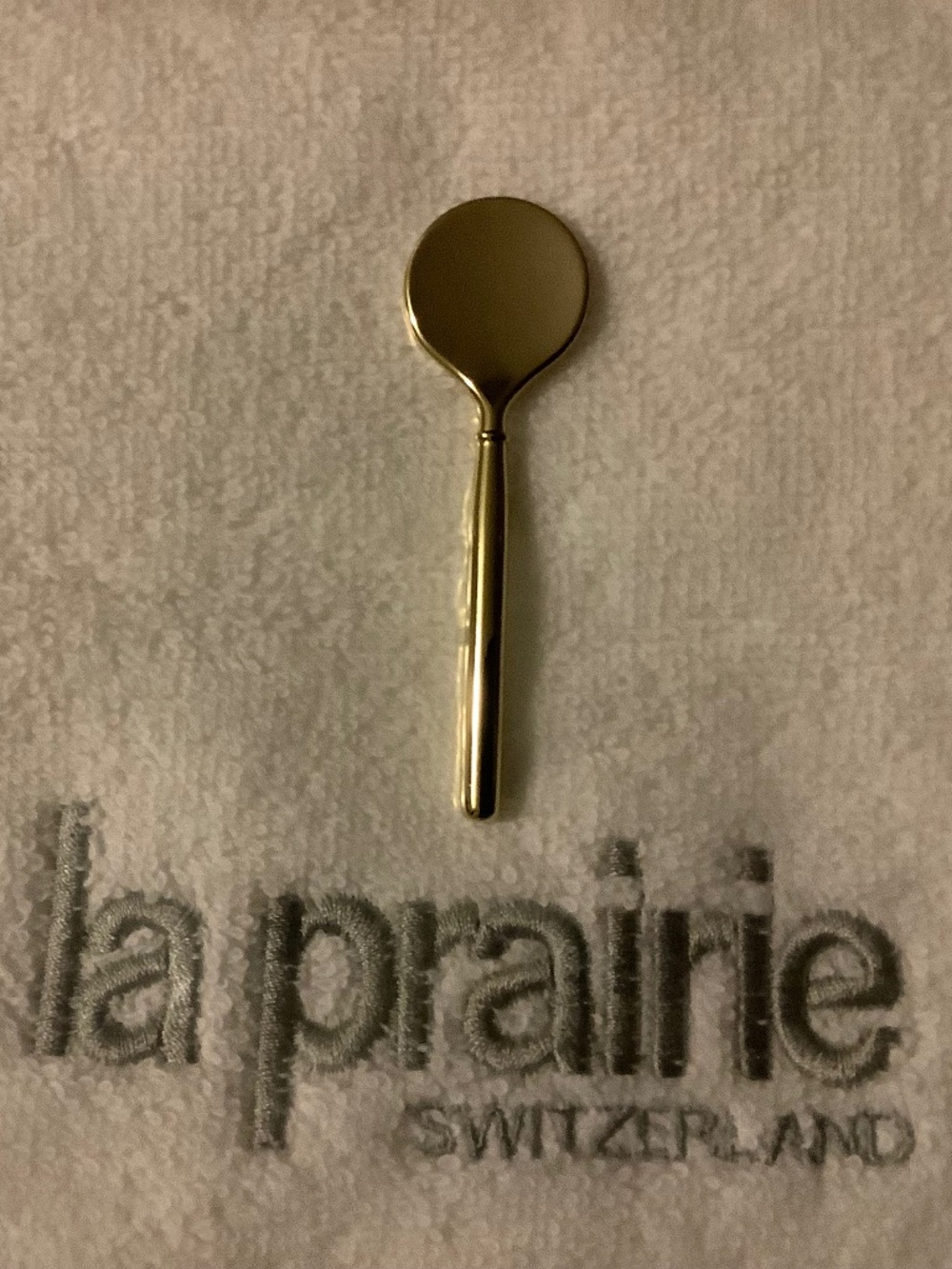 Authentic La Prairie gold-tone spatula applicator